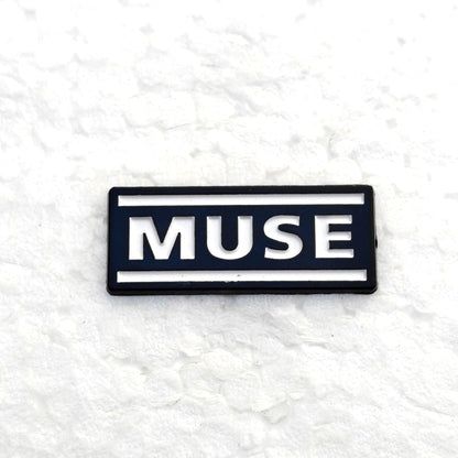 Muse Enamel Pin