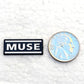 Muse Enamel Pin